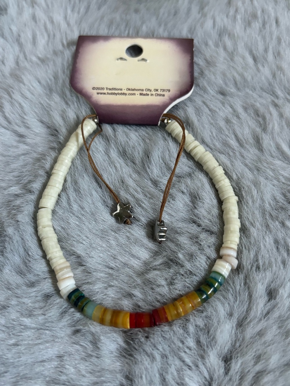 Bead bracelet with string closure